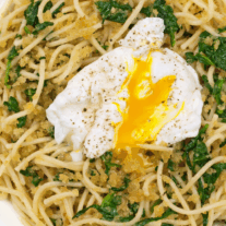 This easy vegetarian pasta features al dente spaghetti tossed with sautéed spinach, golden garlic breadcrumbs, and a perfectly cooked egg.
