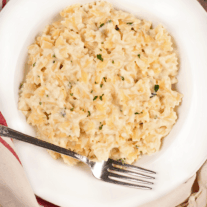 Creamy stovetop mac and cheese; a rich and creamy combination of Fontina, cottage cheese and white wine cooked on the stovetop with farfalle pasta.