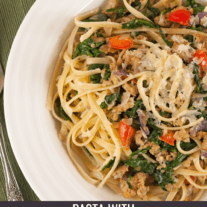 Fresh spinach, bell pepper and crumbed sausage over linguine.