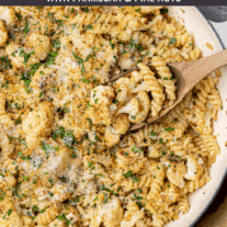Skillet with rotini pasta, roasted cauliflower, parmesan and pine nuts.