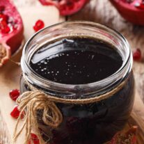A small jar of spiced pomegranate sauce for slow-roasted duck.