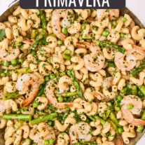 Shrimp pasta primavera; cavatappi tossed with sautéed garlic and onion, asparagus, peas, and chopped parsley.