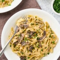 Creamy truffle mushroom pasta with fettuccine, saut&eacute;ed mushrooms, and chopped parsley.