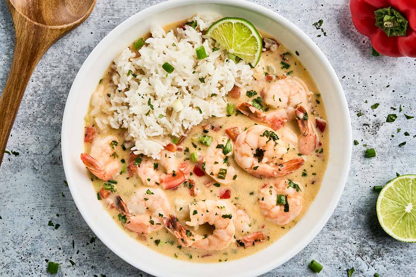 Brazilian shrimp stew with coconut milk, peppers, cilantro, and lime served over white rice.