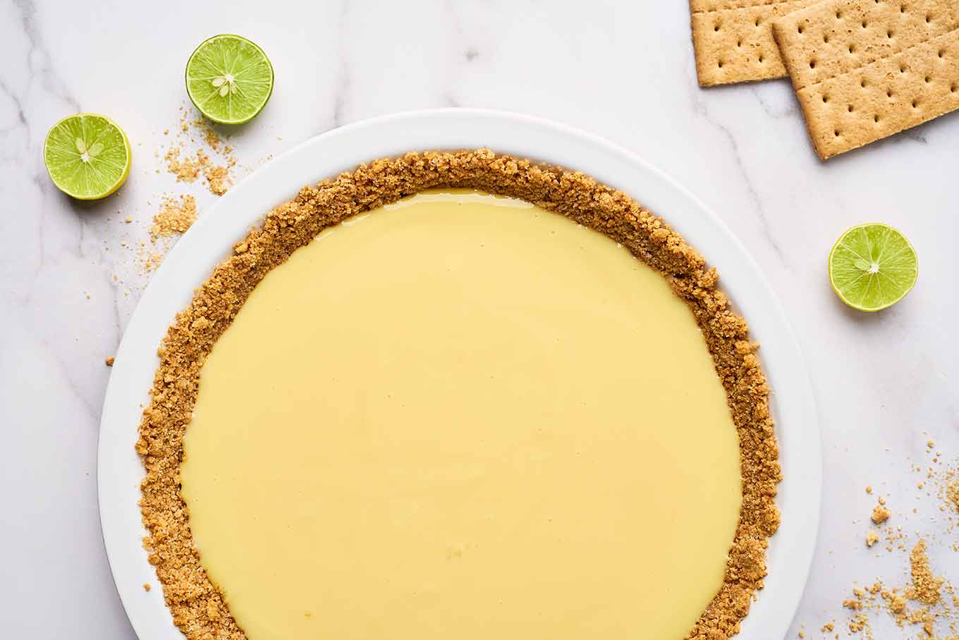 Baked Florida Key lime pie with set filling in graham cracker crust, ready to chill.