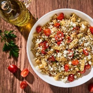 A bowl of Goat Cheese Pasta with Tomatoes from our Main Dish Pasta category.