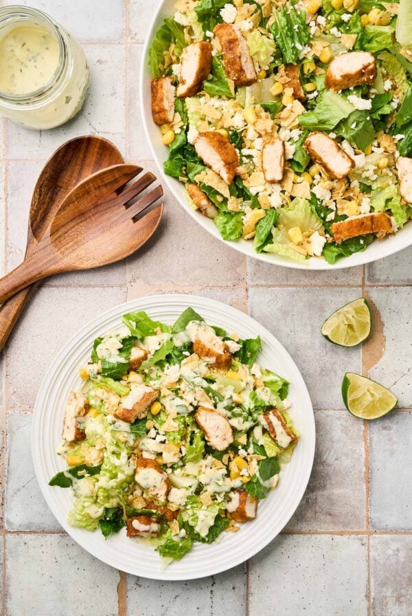 Mexican Caesar salad with chicken, corn, queso fresco, toasted tortilla chips, and creamy cilantro-lime dressing.