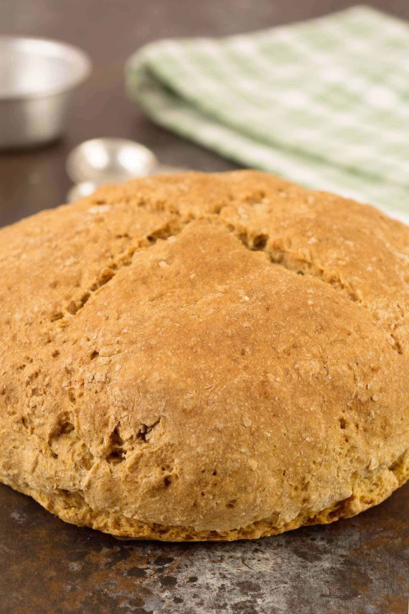 A whole round loaf of baked Irish soda bread