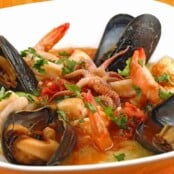 Seafood Medley with Tomato-Butter Sauce and Soft Polenta